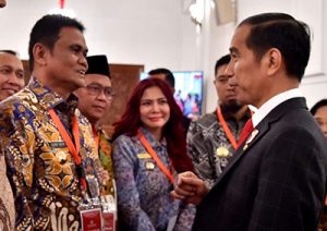 Anugerah UHC JKN-KIS 2018 dari Jokowi Untuk Pemkab Minut