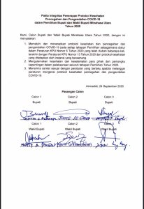 Patuhi Protokol COVID-19, Calon Bupati & Wabup Minut Tanda-Tangani Pakta Integritas